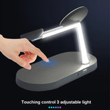Adjustable LED desk lamp with wireless charging base.