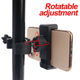 Adjustable smartphone mount with rotatable clamp attached to a pole or stand.