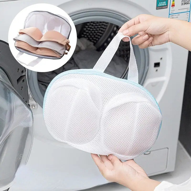 a woman putting a face mask in front of a washing machine