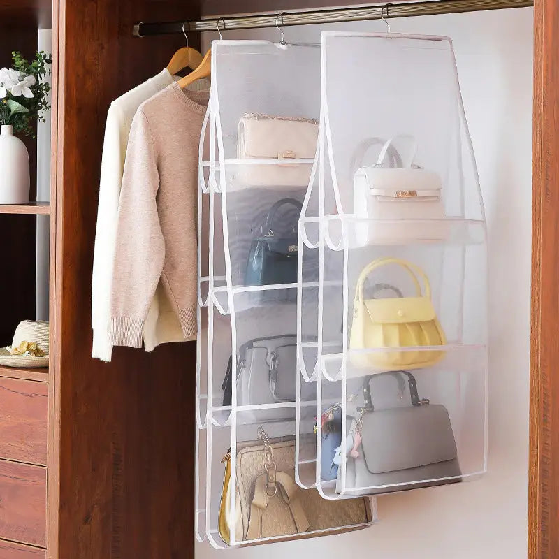 a closet with a white hanging organizer and a white bag