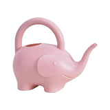 a pink elephant shaped teapot with a handle