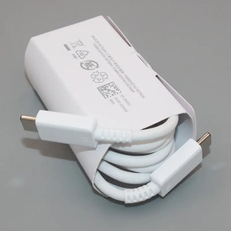 a white charger with a cable attached to it