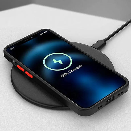 an iphone with a charging charger attached to it