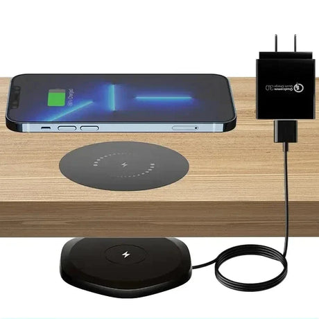 an image of a charging station with a phone and a charger