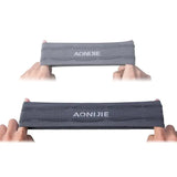 a close up of two hands holding a pair of anodie