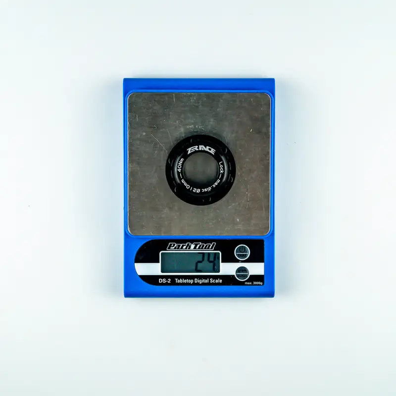 a blue cassette with a black and white label