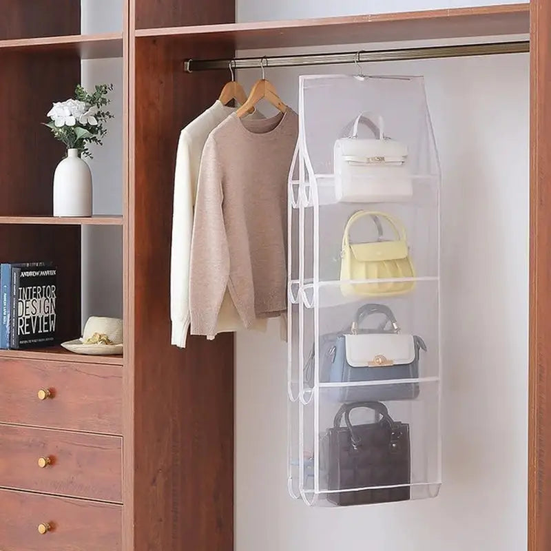 a closet with a hanging organizer and a coat rack