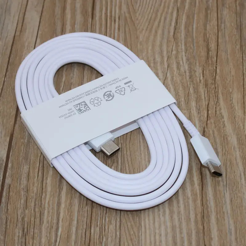 a close up of a white cable connected to a charger