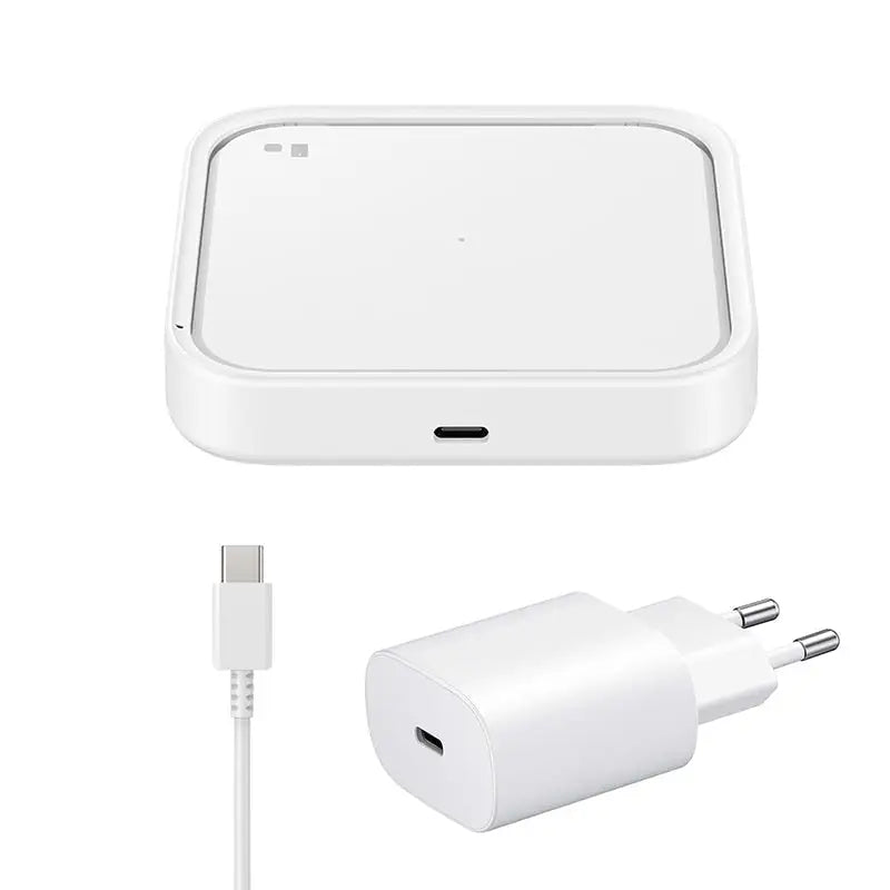 a close up of a white device with a charger and a cable