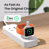 an apple watch charging station on a wooden table