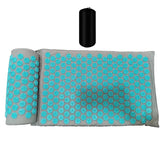 a blue and grey pillow with a black pole