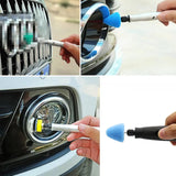 arafed image of a car with a blue brush and a hand holding a blue toothbrush