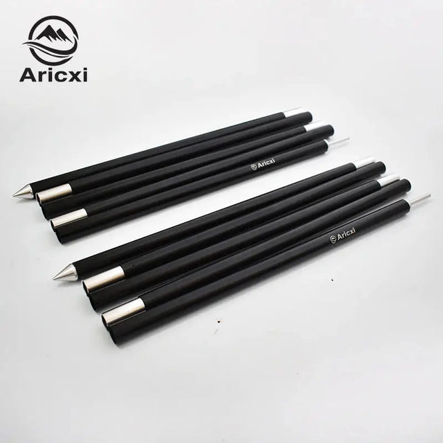 three black pens with white ink on them