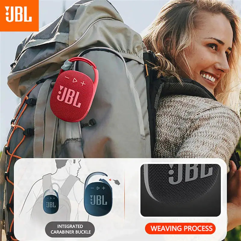 a close up of a woman with a backpack and a jbl headphones