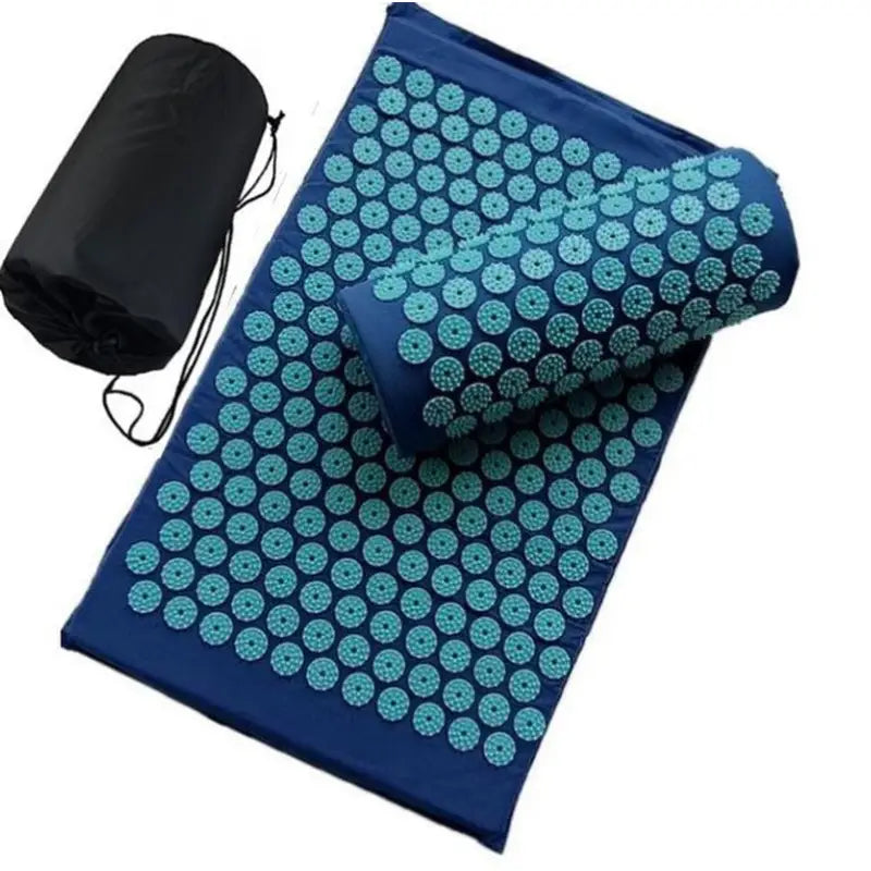 a blue and green yoga mat with a black bag