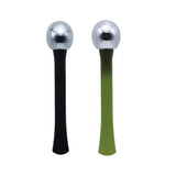 a pair of green and black spoons