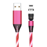 a close up of a pink and black cable connected to a charger