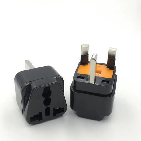 two black plugs on a white background