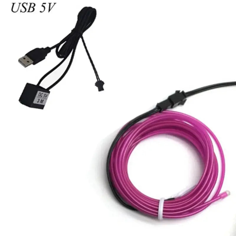 a close up of a pink usb cable connected to a computer mouse
