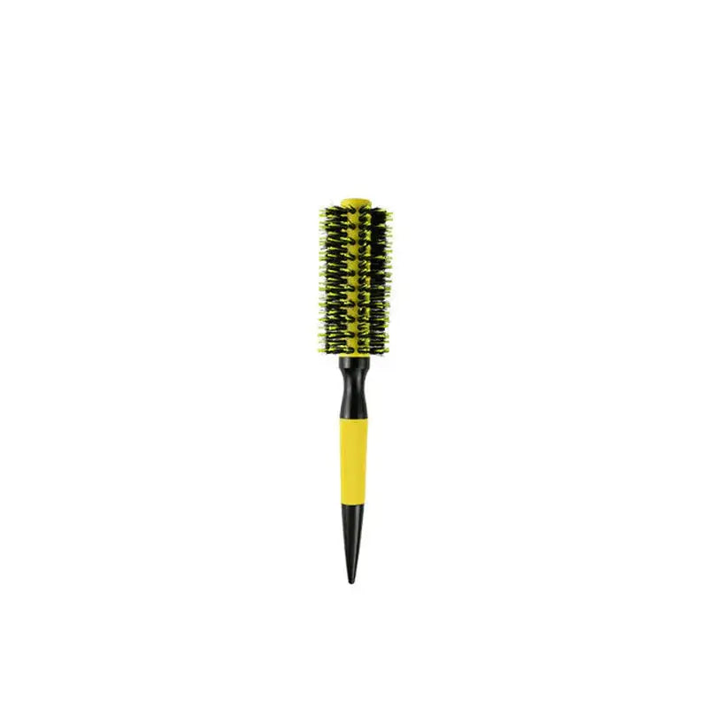 the brush brush is a yellow brush with black handle