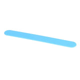 a close up of a blue plastic nail file on a white background