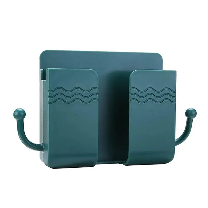 a pair of green bookends with waves