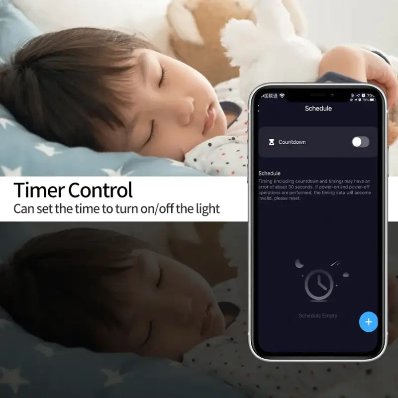 a baby sleeping in bed with the time control app on the screen