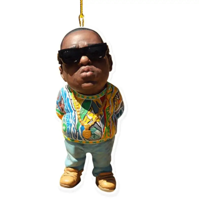 a baby doll wearing sunglasses and a shirt