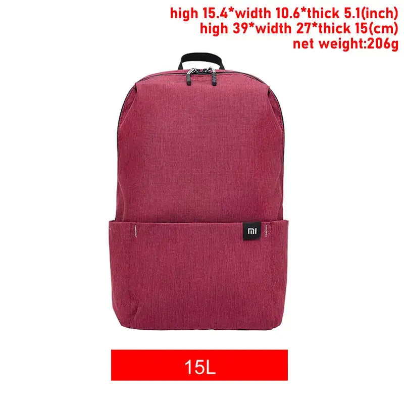 the backpack is a large, red backpack with a zipper closure