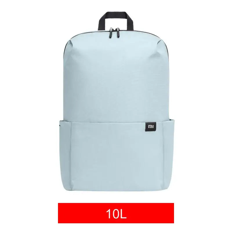 the backpack is a light blue backpack with a black handle