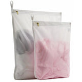 two bags with pink and white tissue tissue