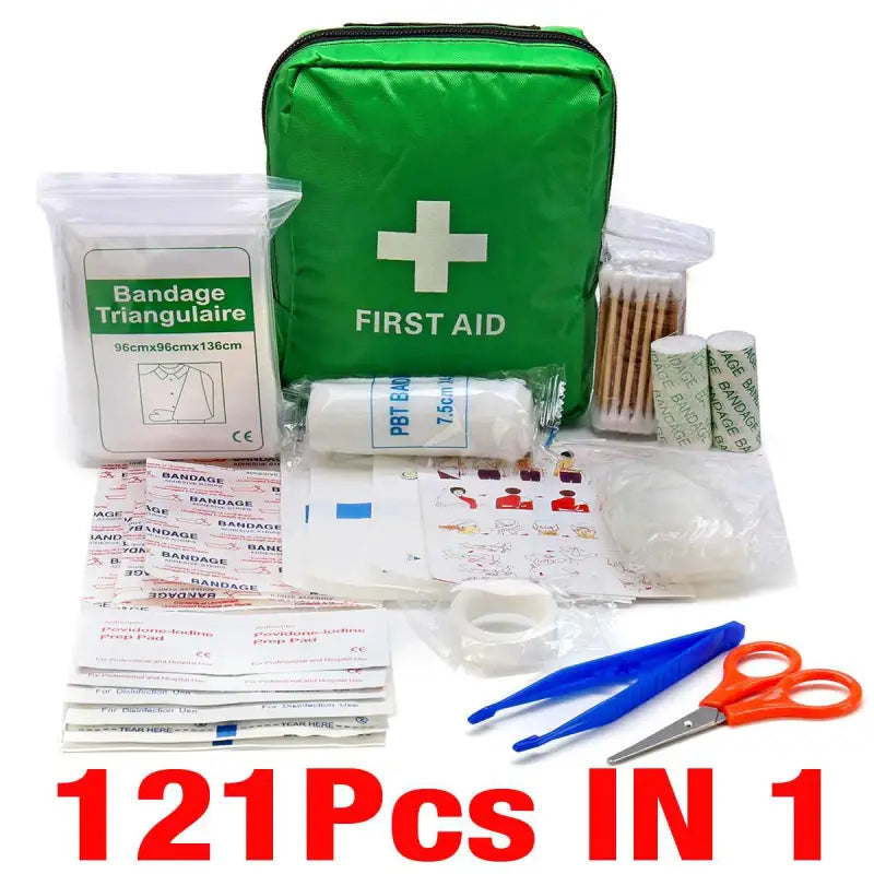 a first aid kit with a green bag and scissors