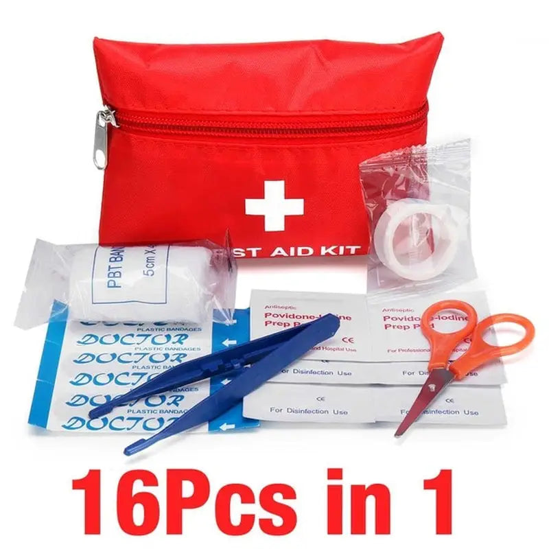 a first aid kit with a red bag and scissors