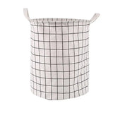 the white and black plaid laundry basket is shown with a black and white plaid pattern