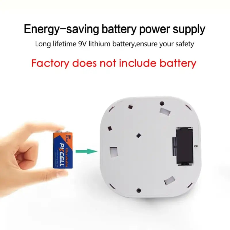 Someone is holding a battery and a small battery in their hand