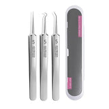 a set of three dental instruments with a pink handle