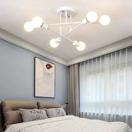 A bedroom with a bed and a ceiling fan