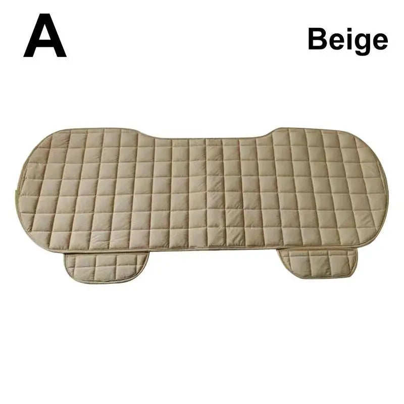 a beige dog bed with a white background