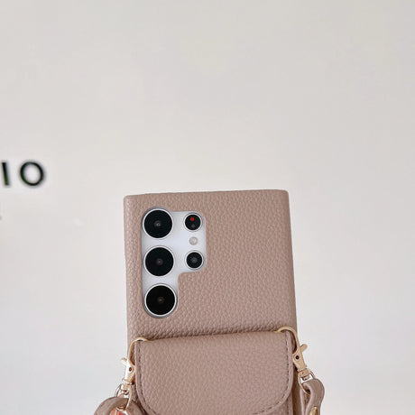 Beige leather phone case with a camera cutout and attached pocket.