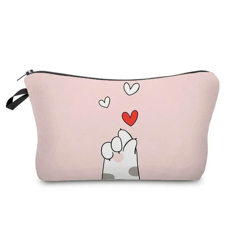 a pink cosmetic bag with a cartoon dog holding a heart