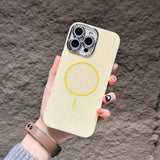 Beige phone case with yellow circle.