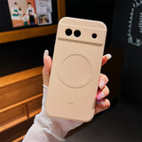Beige smartphone case with circular indentation and camera cutouts.