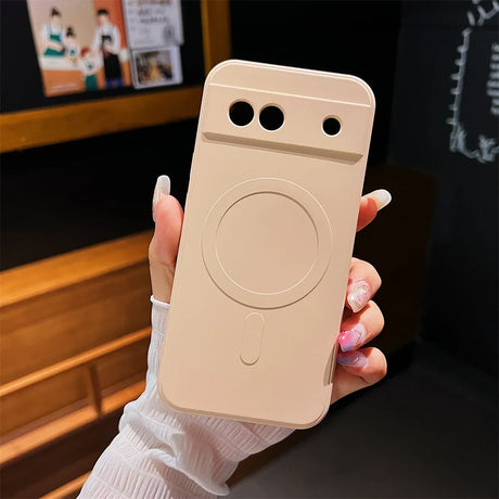 Beige smartphone case with circular indentation and camera cutouts.