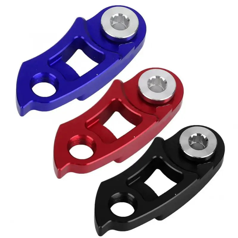a pair of aluminum pedals with a red and blue pedal