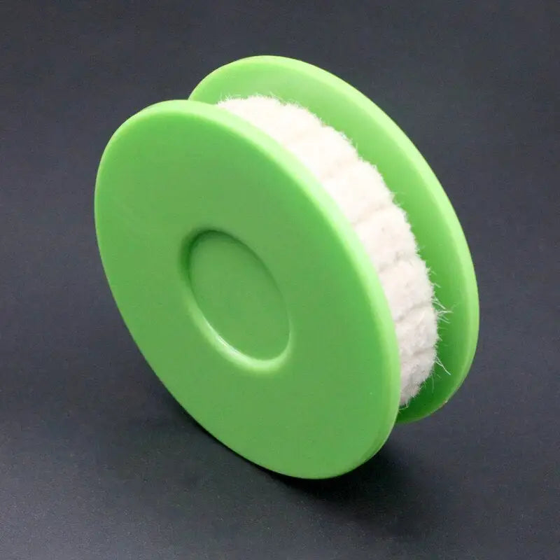 a green wheel with white foam on it
