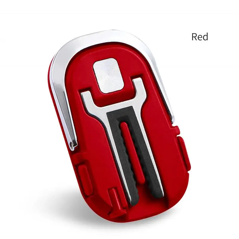 the red and white bottle opener is attached to a bottle opener