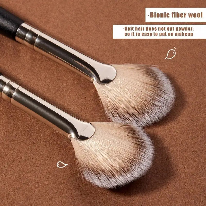 two brushes on a brown background