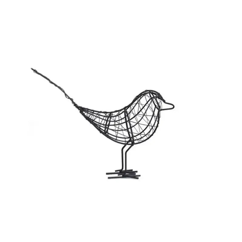 a bird made out of wire on a white background