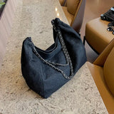 a black bag sitting on top of a counter