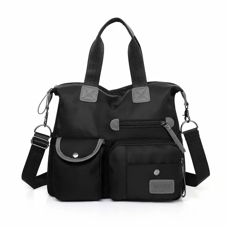 a black bag with two pockets and a strap